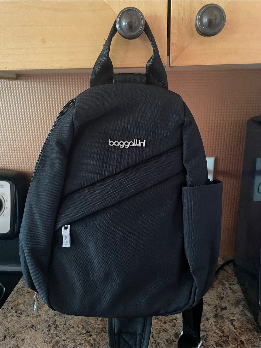 Baggallini Black Diagonal-Seam Sling Backpack